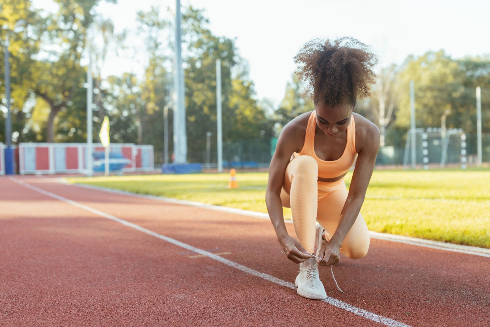 Pratiquante amateur pendant une séance de course à pied
